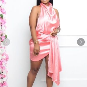 Peach-colored backless dress. Cute for a wedding. Brand new, never worn.